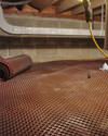 Crawl space drainage matting installed in a home in St. Marys
