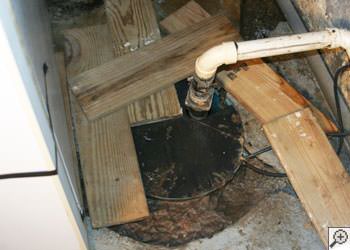 An ugly, clogged sump pump system in Aylmer, Ontario
