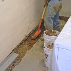 Digging a trench for a French Drain system in Chatham