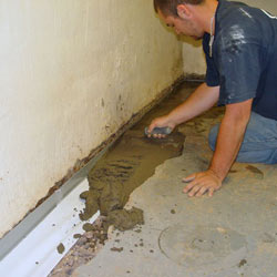 Testing a French drain system in a Wallaceburg home.