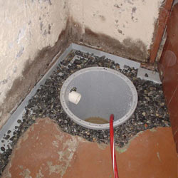 Installing a sump in a sump pump liner in a Windsor home