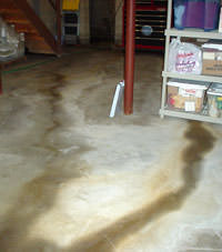 Flooding entering a basement through a floor crack in Goderich